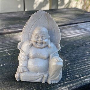 Laughing Buddha carving